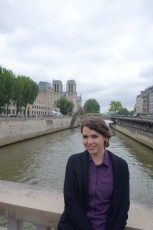 The Seine river is under you and Notre Dame is behind you.